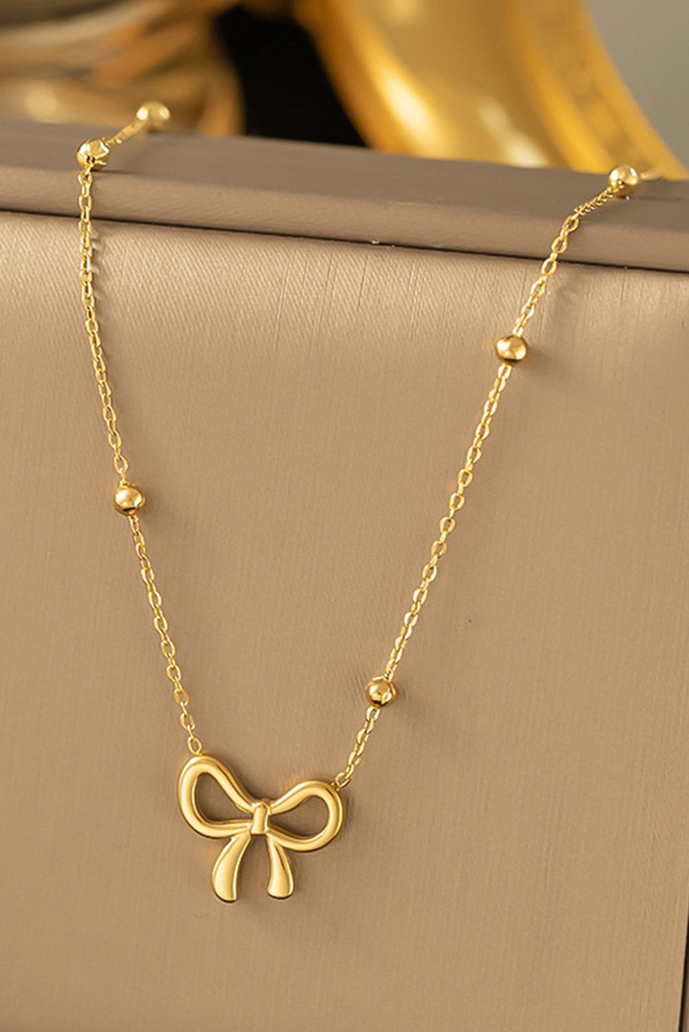 The Gold Bow Necklace